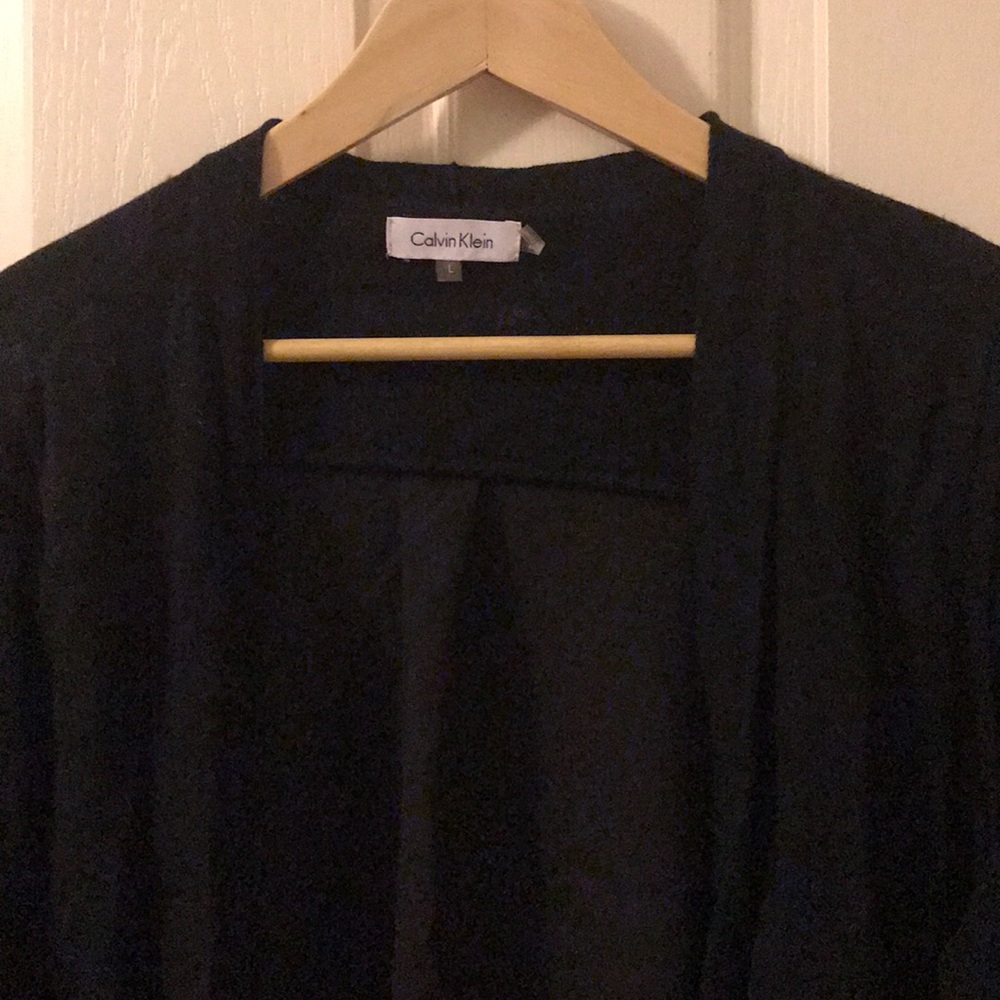 Black open front sheet sweater